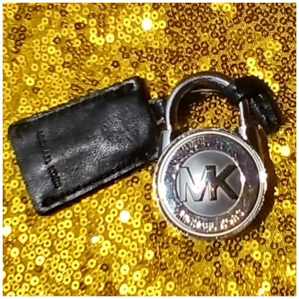 Michael Kors Black and Silver Key Holder And A Clothe Cleaner